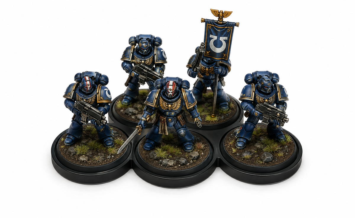 Five painted blue marine miniatures on a 32mm 3x2 cloud movement tray