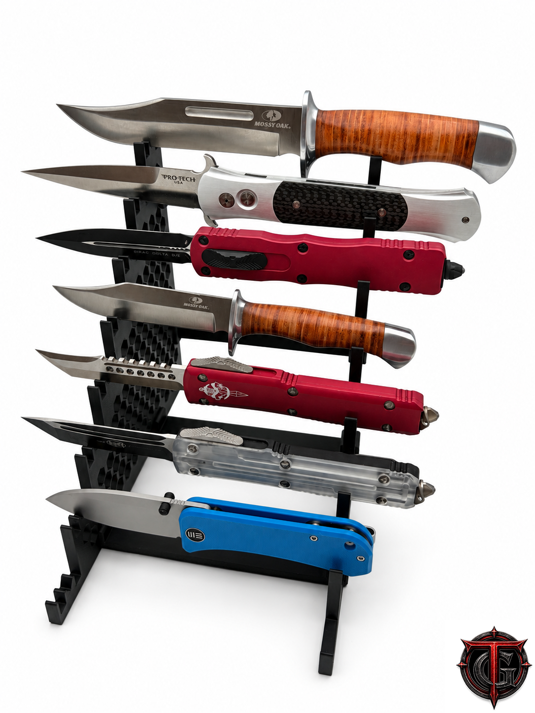 Front view of the matte black 8 Knife Display Stand holding eight fixed knives, blades in the V-grooves and handles on the shelves