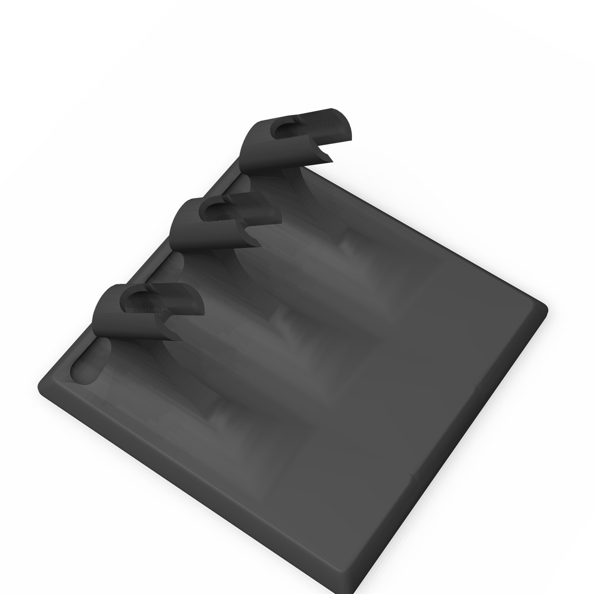 Top-down view of the three airbrush stand showing the base and drip catches