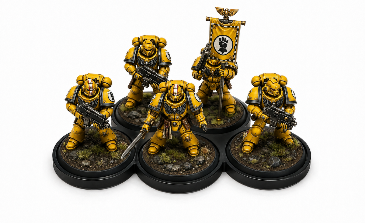 Five painted yellow marine miniatures on a 32mm 3x2 cloud movement tray