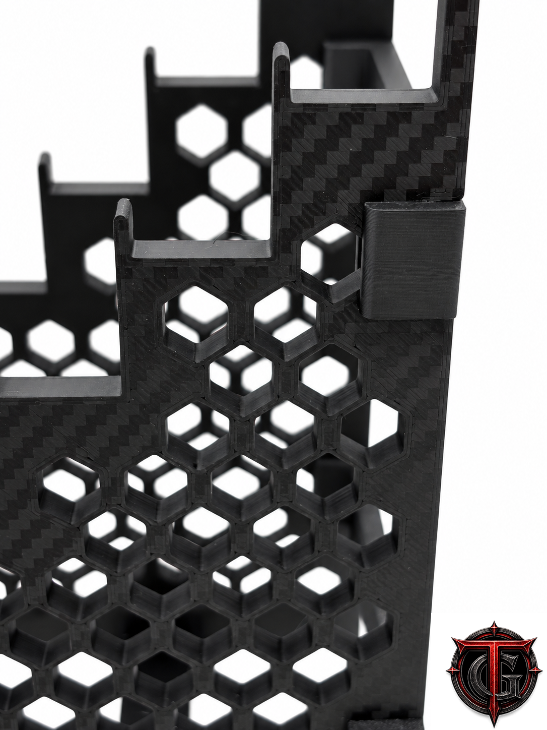 Close-up of the matte black carbon fiber look side panel on the 8 Knife Display Stand