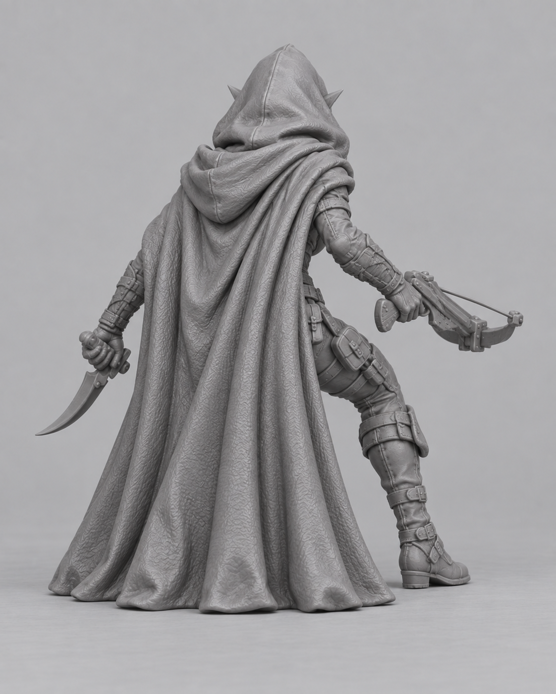 Unpainted drow rogue miniature, rear view