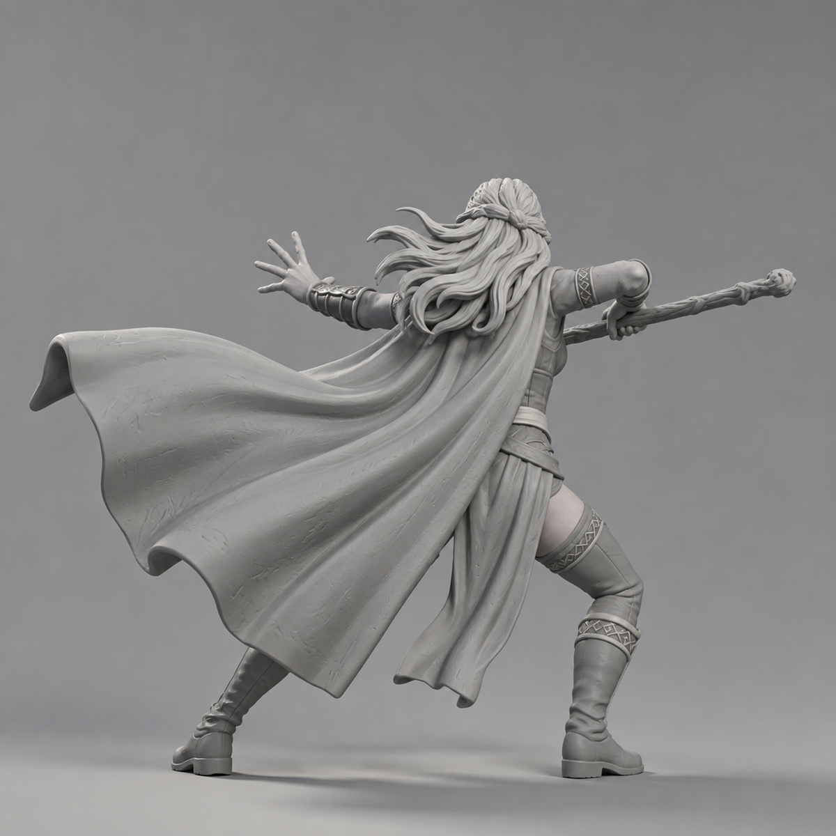 Unpainted human wizard miniature, rear view